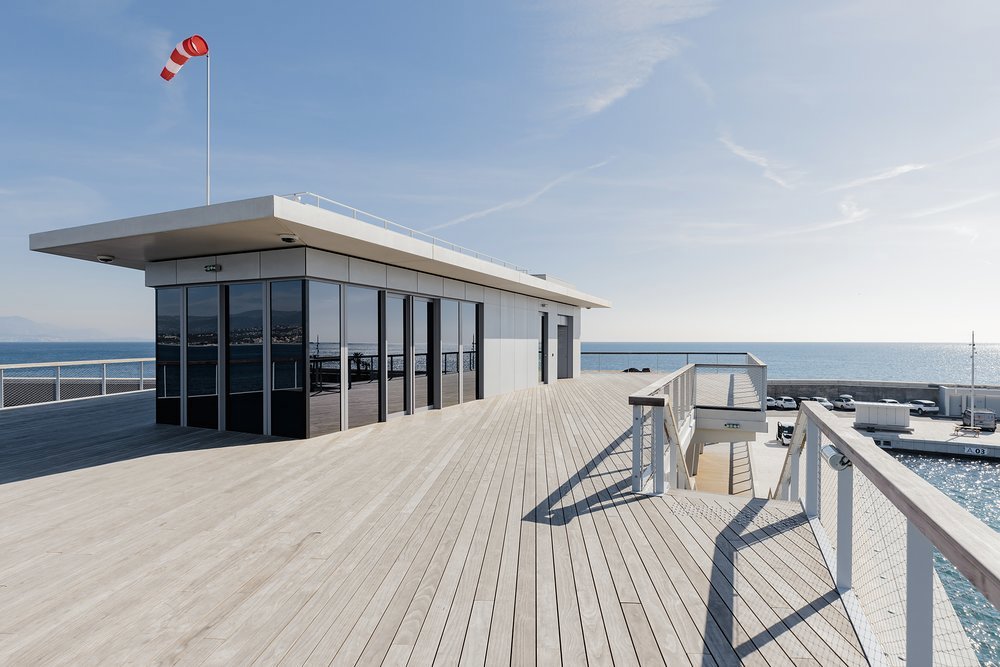 The yacht club's rooftop terrace has enviable views over the marina and the yachts anchored off due to no available berths. You could make one yours