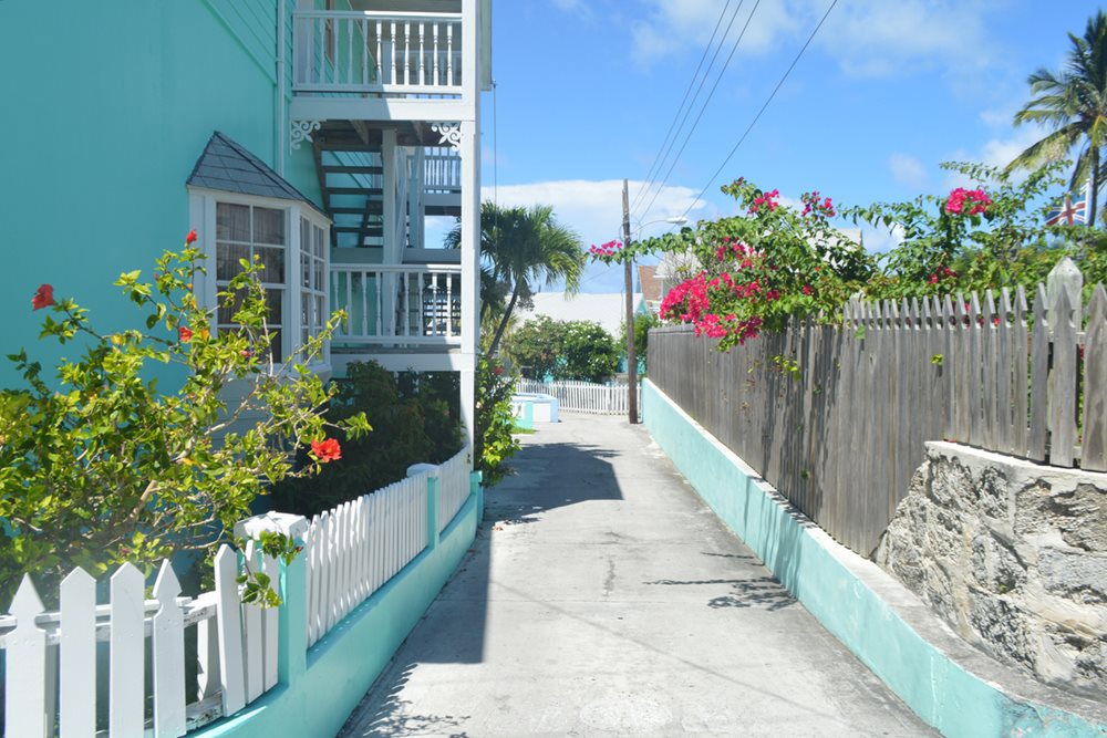 Take a stroll through the vibrant picturesque village of New Plymouth, and quench your thirst with a Goombay Smash, the national drink