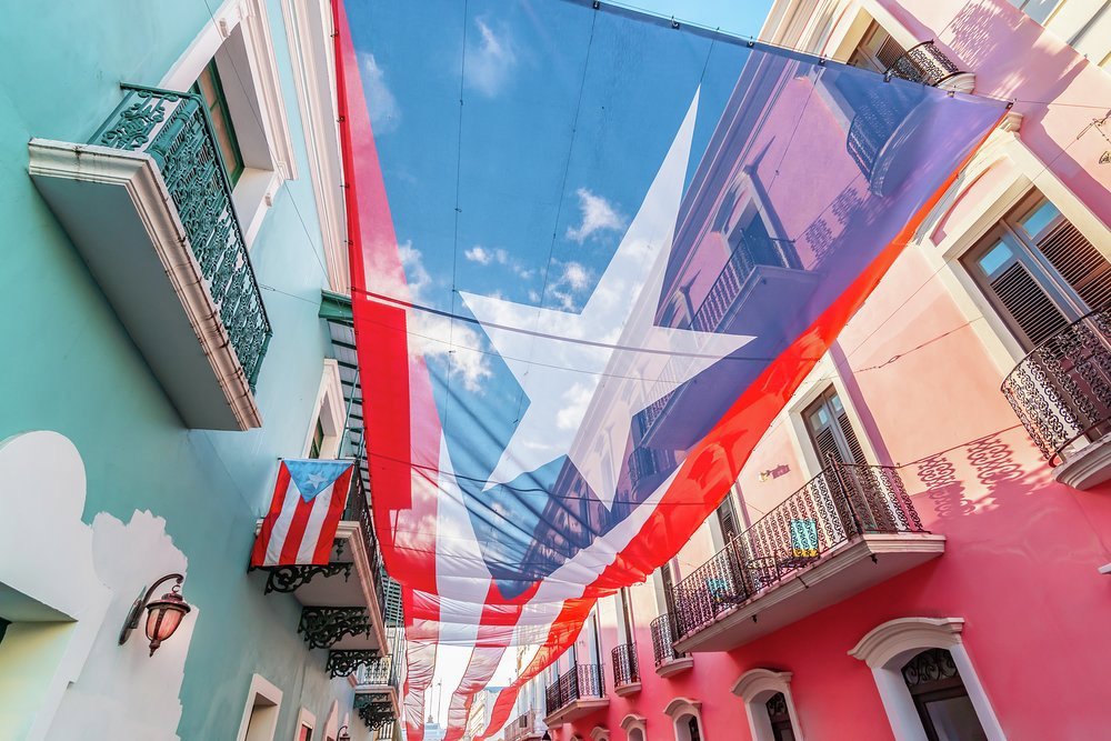 Fabulously colourful and characterful streets in the old town contrast with the weathered stone of San Felipe del Morro Fortress in Old San Juan