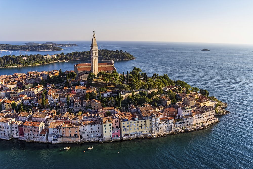 The tower of St Euphemia cathedral dominates the skyline of this old fishing village, which is now home to two Michelin-starred restaurants