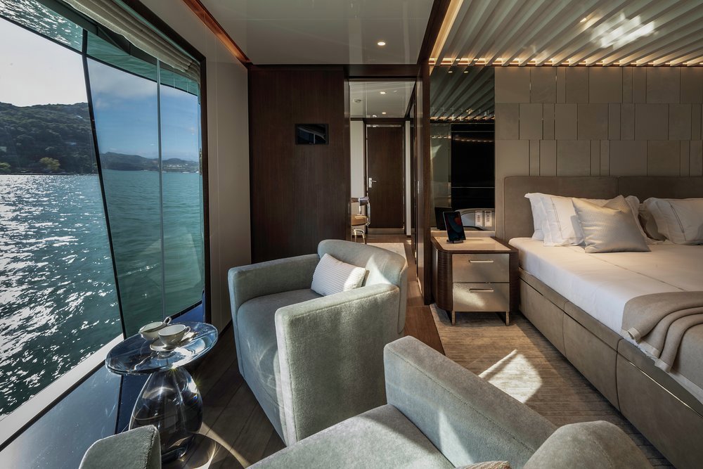 The full-beam master suite has a lounge next to a full-height window, a blissful place to start the day