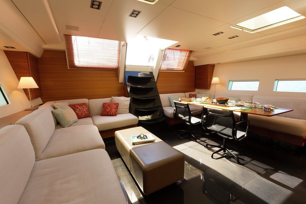 Looking aft in the saloon with lounge and dining areas
