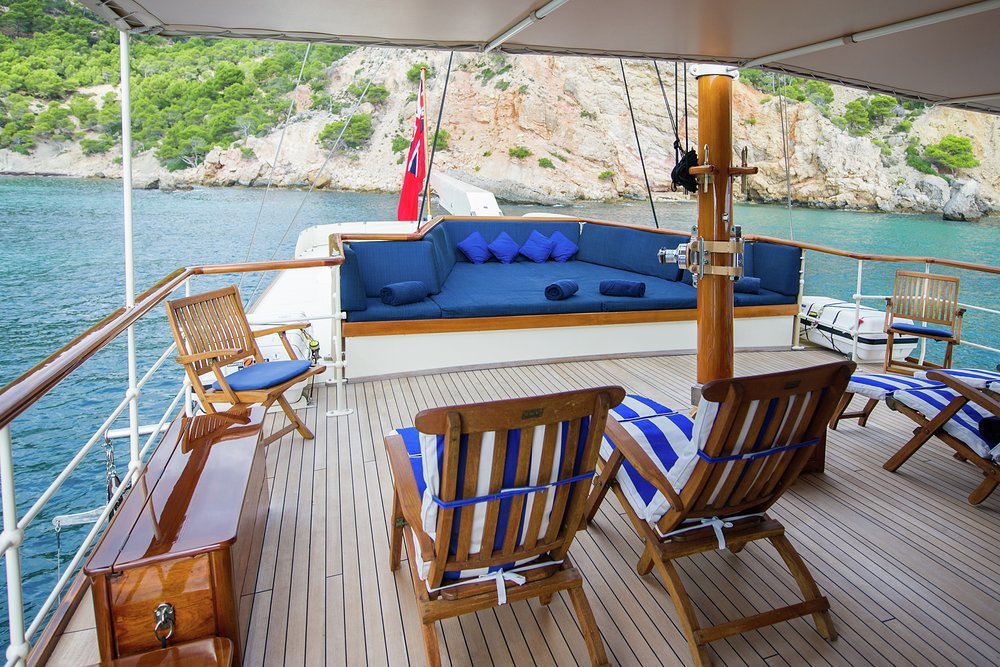 Sun loungers and a huge sunpad on the upper deck aft
