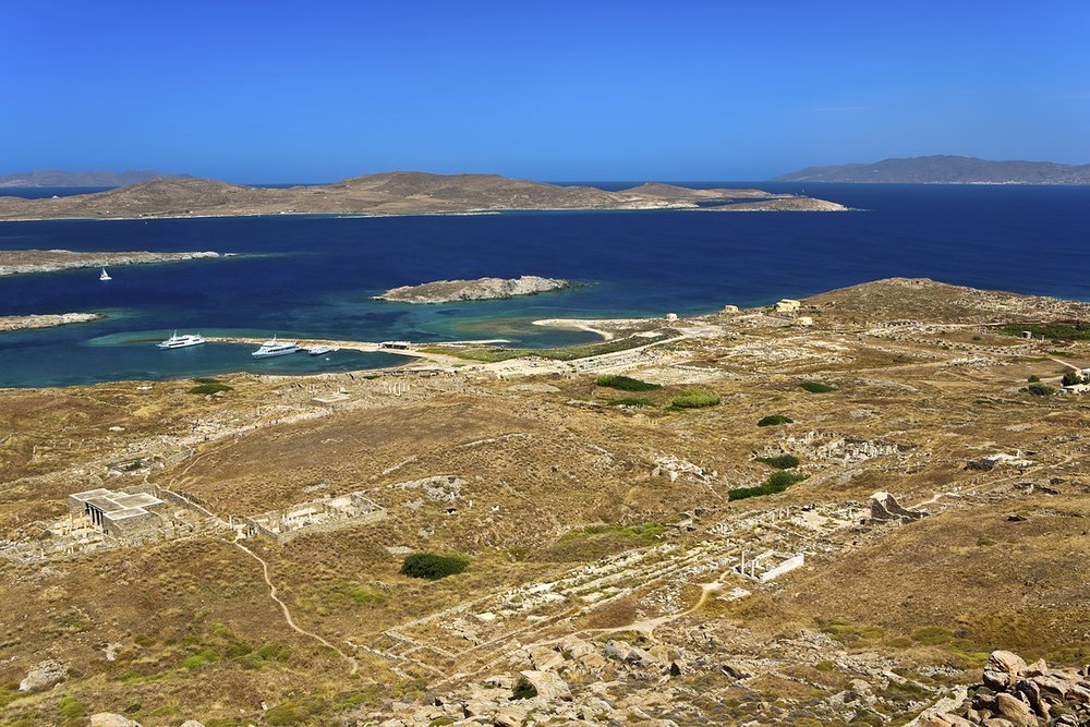 Delos, in the Cyclades, has been inhabited since the third millennium BC and myhtology says it is the birthplace of Apollo and Artemis