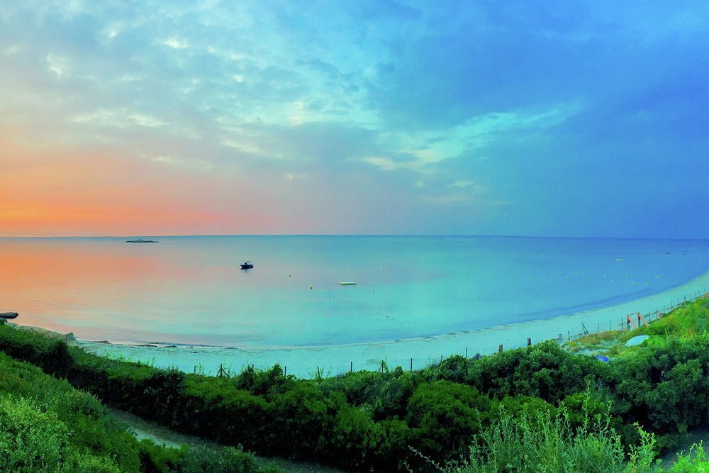 The sun rises over Salins Beach 